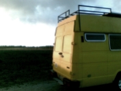 the yellow van of leonor. she makes soap by hand.